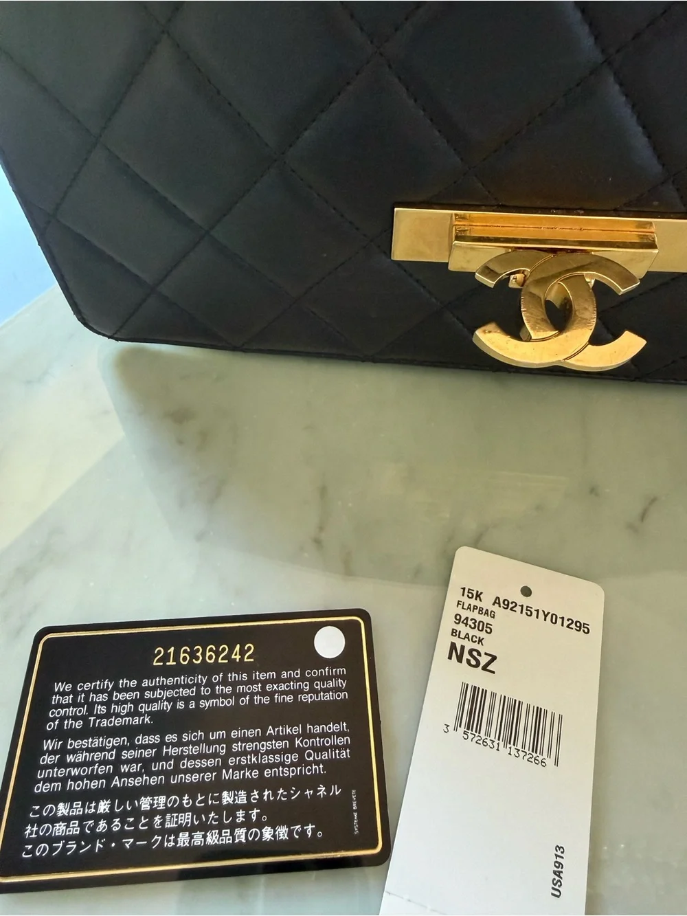 CHANEL Black Quilted Shoulder Bag with Gold Hardware